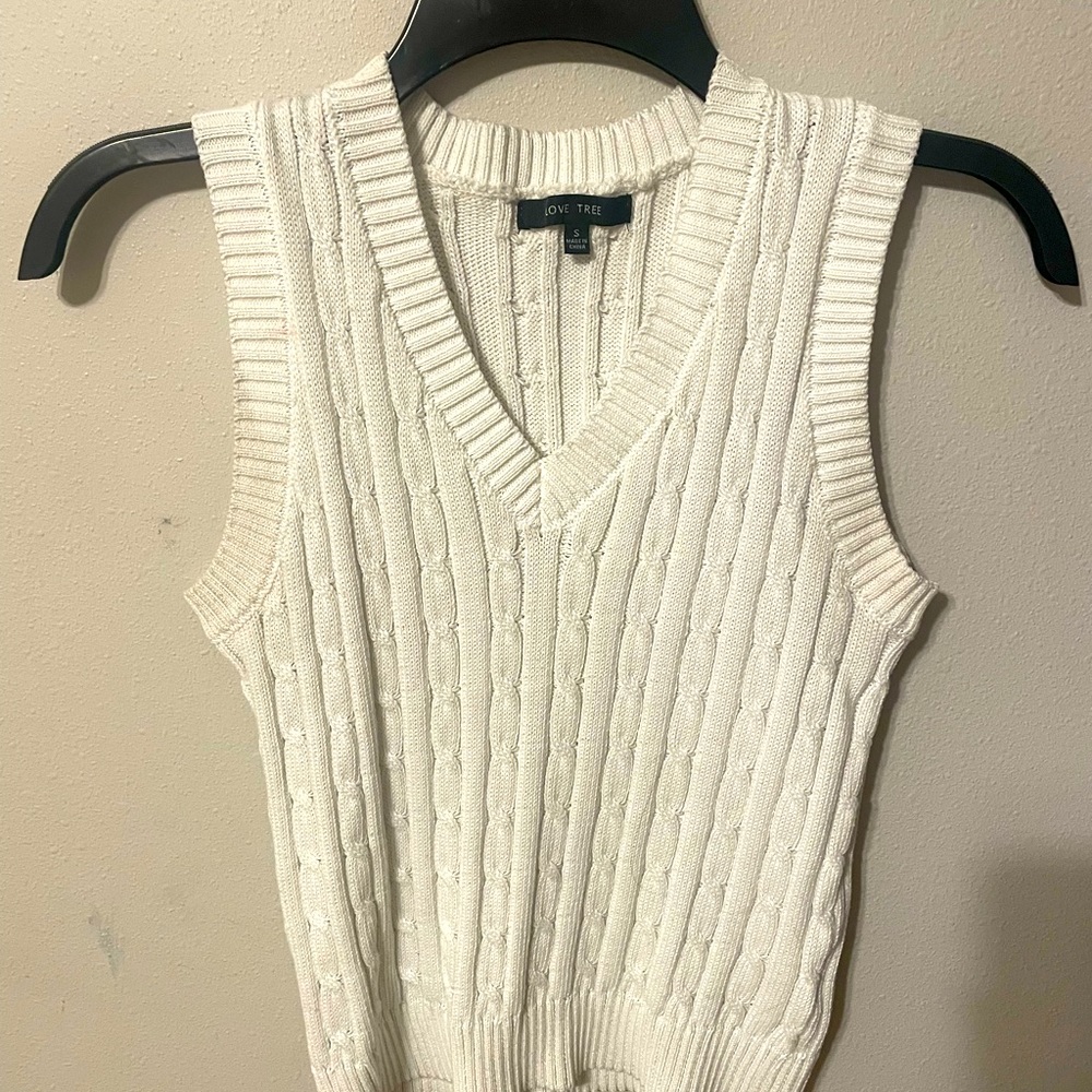 White sweater vest
